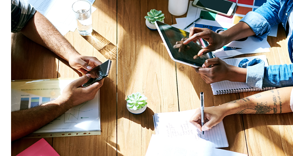 High angle shot of a group of designer doing marketing research 