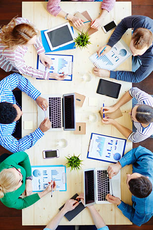 Team of businesspeople making financial reports