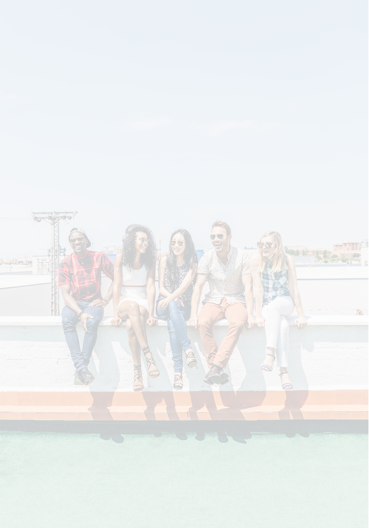Group of Multi-Ethnic Friends Hanging out in a Rooftop 