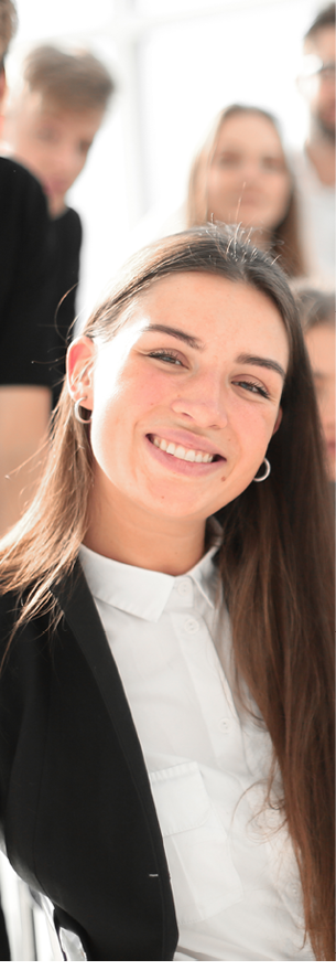 young business woman on the background of her colleagues